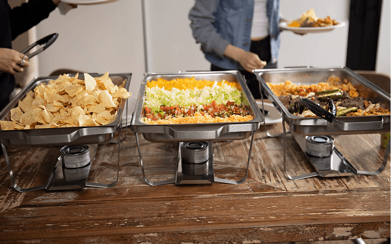Fajita and fixings in catering pans